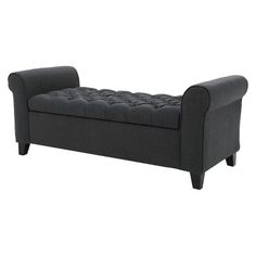 a black couch with buttons on the back