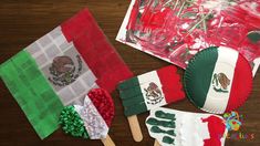 paper plates and mexican flags are sitting on the table next to some crafting supplies