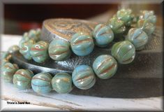 a close up of some beads on a table