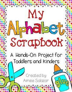 an alphabet scrapbook with scissors and baby items on it's front cover, which reads my alphabet scrapbook