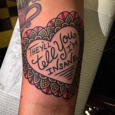 a woman's arm with a tattoo that says, they all you need is love