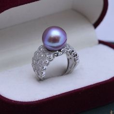 Looking for a timeless piece of pearl jewelry to add to your collection? House of Pearls’ 12-13mm Freshwater Pearl & Large Full CZ Wide Diamond Ring is the perfect classic addition. This ring offers a large 12-13mm freshwater pearl alongside a large full CZ diamond, making it wearable luxury. Celebrate your special moments by wearing this beautiful pearl & diamond ring. White 12-13mm Freshwater Pearl Ring This popular ring design features AAAA quality, round freshwater pearls measuring 12-13mm. Luxury Silver Pearl Ring, Luxury Round Cut Cubic Zirconia Pearl Ring, Luxury White Pearl Drop Ring, Luxury Cubic Zirconia Pearl Promise Ring, Luxury Pearl Drop Promise Ring, Luxury Diamond Ring With Pearl Drop, Luxury Exquisite Diamond Pearl Ring, Luxury Silver Tahitian Pearl Ring, Luxury Akoya Pearl Ring With Pearl Drop