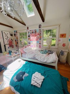 a bed room with a neatly made bed next to a window