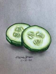 two slices of cucumber are shown on a gray surface