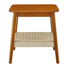 a wooden table with a woven seat on it's bottom and one foot in the middle