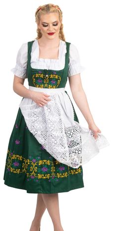 ***************** ***********   DIRNDL   **********  Made By "  DIRNDL TRACHTEN HAUS  " **  Color  ** In A Gorgeous Dark Green EMBROIDERY  In A Pretty Dark Yellow, Purple and Green Material 80 % COTTON 20 % POLYESTER The Top Of The Dirndl is " LINED  " On The Inside  Zipper Has A Zipper In The Front ___________________ NOTICE *  On The Underside The Pretty Embroidery At The Bottom Is Backed With White Backing. I have taken a photo so you can see this. Please Look At The Photo :-)) This is a really nice feature as it will keep your Pretty Embroidery from coming unraveled :-)). ___________________ NOTICE The Wonderful " EMBROIDERY " At The Base Goes All The Way Around The Dirndl ***  Embroidery:  13" High  *** ***************** ************    CROP TOP   *********** **  Color  ** In White ** Traditional Irish Dress, Green Dirndl, Dark Green Embroidery, High Crop Top, German Dirndl Dress, Dirndl Dress Oktoberfest, Apron Top, German Dress Dirndl, Lace Apron