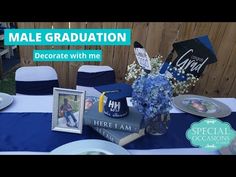 the table is set up with blue and white decorations