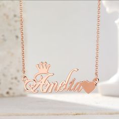 Every little girl is a princess, which is why she should have a Crown Name Necklace around her neck. Any girl would love to wear her very own personalized princess necklace. You can choose 18k gold finish, Rose gold or Sterling silver. All girls should feel like princesses when wearing this necklace!