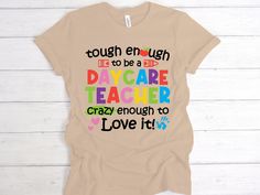 a t - shirt that says tough enough to be a day care teacher crazy enough to love it