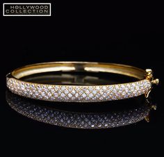 "【Glittering Elegant Bangle Bracelet】 ★ High Quality AAA Diamond cz Pave setting ★ The word \"Pave\" comes from French and means \"Paved\" ★ Looks like as it have been paved with Diamond ★ Pave Bangle is a Must-Have jewelry to make you look like celebrities ★ Perfect for Wedding, Party, Anniversary, Night Out, and Special Occasions 【Product Details】 Metal: 925 Starling Silver 18KG Plated Stone: Diamond cz Settings: Pave Setting Size: Inner Circumference 18cm (7 inches), Maximum width 7mm (0.28 i Jewelry To Make, Pave Bangle, Celebrity Jewelry, Hollywood Celebrity, Heritage Jewellery, Gold Necklace Designs, Starling, Pave Setting, Diamond Bangle