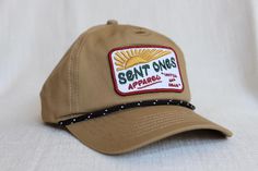 This unstructured rope hat features an embroidered patch with our motto "Until All Hear" on the front and the phrase "Every People Every Place" tagged on the back, both powerful reminders of God's vision from Genesis to Revelation and our call to partner with Him until it's completed.  Your purchase directly supports cross-cultural workers pursuing the multiplication of disciples, churches, and leaders. Casual Outdoor Snapback Hat With Embroidered Patch, Casual 5-panel Snapback Hat With Embroidered Patch, Adjustable Snapback Hat With Embroidered Patch For Outdoor, Summer Hats With Adjustable Logo Patch, Summer Adjustable Snapback Hat With Embroidered Patch, Adjustable Summer Hats With Logo Patch, Outdoor Adjustable Baseball Cap With Embroidered Patch, Powerful Reminders, Embroidered Patch