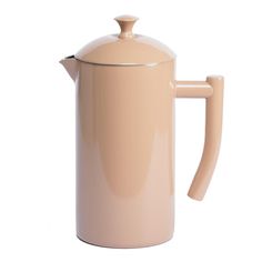 a cream colored coffee pot with a handle on the top and bottom, is shown in front of a white background