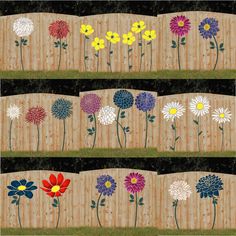 four rows of colorful flowers on a wooden fence