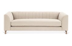 an image of a beige couch on a white background