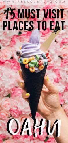 a person holding an ice cream cone with the words, 75 must visit places to eat