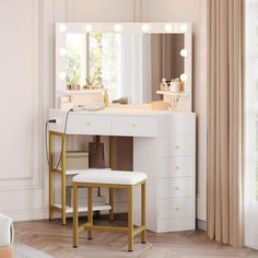 a white vanity with lights on it and a stool in front of the mirror that is open