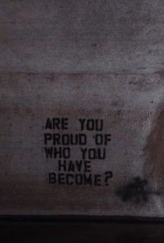 a sign on the side of a building that says are you proud of who you have become?