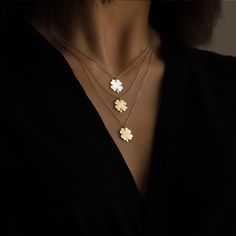 14K Gold Four-Leaf Clover Necklace: A universal symbol of good luck and fortune, this minimalist and dainty solid gold necklace is the perfect accessory for every day. It looks stunning on its own but can also easily be layered with a variety of other necklaces. Whether you're looking for a St. Patrick's Day treat, or a versatile piece to add to your collection, this necklace is great for any occasion!  Check out our 14K gold four-leaf clover hoop earrings to make an eye-catching set!   Material Shamrock Jewelry, Gold Four Leaf Clover, Dainty Jewelry Necklace, Four Leaf Clover Necklace, Celestial Necklace, Solid Gold Necklace, Jewelry Minimalist, Dainty Gold Necklace, Minimalist Gifts