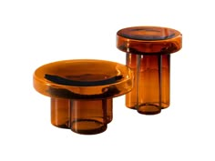 two orange glass vases sitting next to each other