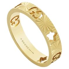 Gucci Icon 18ct Yellow Gold Star Band Ring YBC727729001 This precious ring is presented in 18ct yellow gold with a delicate band featuring the GG motif. The piece's focal point is a cut-out star, that recalls the Gucci Cosmogonie fashion show. Taking place beneath the night sky at the Italian Castel del Monte, the collection draws inspiration from star constellations. Width: 4mm. This item will arrive beautifully packaged in a unique Gucci presentation box. Gucci Rings, Precious Rings, Star Constellations, Diamond Supply, Icon Collection, 18k Yellow Gold Ring, Star Ring, Gold Pattern, Yellow Gold Ring