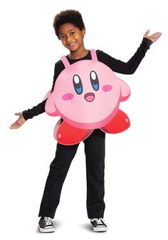 a young boy is dressed in an adorable pink poop costume and holding his arms out to the side