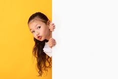 Asian girl hiding behind blank white Funny Asian, Yellow Studio, Advertising Billboard, Asian Humor, Blank Banner, Interactive Walls, Studio Wall, Dream Life House, Kid Character