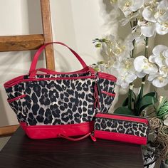 Coach Park Ocelot Print Carrie Tote Bag With Accordion In Canvas And Red Leather Trim Color Style #F2378 Msrp $328 Silver Hardware Red Black White Brown Fabric And Leather Exterior Two Functional Zip Pockets Inside One Open Slip Pocket One Inside Back Full Wide Wall Zipper Pocket With Leather Pull Two Exterior Side Slip Pockets Measurements 9.75” H X 17” L X 6” D Coach Leather Tassel Coach Embassy Leather Hang Tag Gray Satin Interior Lining 8.5” Dual Leather Straps Drop With Rings Preowned: Exte Brown Leopard, Brown Fabric, Zip Wallet, Trim Color, Coach Leather, Leather Pulls, Leather Tassel, Bag Organization, Color Style