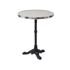 Brings Back the Charm of Parisian Cafe Life in 1930s The Rive Gauche Parisian Bistro Table by BOXHILL brings back the charm of Parisian cafe life in the 1930s. A solid powder-coated pedestal and tripod base supports a round faux marble tabletop with a charming brass edge. The smooth laminate tabletop is heat and scratch-resistant, easy to clean, and tolerates all weather conditions. Designed for outdoor dining at a sidewalk cafe, brasserie, or restaurant, the Rive Gauche makes a charming table-f Outdoor Bistro Table, Table Base Design, Cast Iron Table Base, Parisian Bistro, Laminate Table Top, Outdoor Bistro, Bistro Table Outdoor, French Bistro, Patio Dining Table