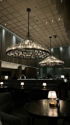 a chandelier hanging from the ceiling in a restaurant