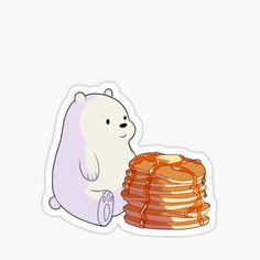 a polar bear sitting next to a stack of pancakes