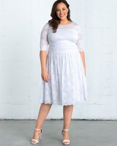 Start your happily ever after in our Aurora midi lace dress with sleeves. A ruched waist and A-line skirt will keep you comfortable and flatter every curve.  This plus size short lace wedding dress features a beige mesh lining to help hide bra straps, while the soft scalloped lace offers a classic feminine feel on your big day.Please Note: View the Details tab below for our Sharktag Policy. Please Note: This style is excluded from all coupon codes and promotions. Hide Bra Straps, Midi Lace Dress, Short Lace Wedding Dress, Elegant Dresses Short, Chic Cardigan, Classic Feminine, Evening Gown Dresses, Lace Dress With Sleeves, Short Lace Dress