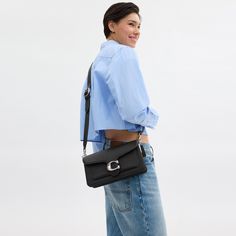 A modern take on an archival 1970s Coach design our structured Tabby shoulder bag is crafted of polished pebble leather. Finished with our Signature hardware for an iconic touch the compact 26 features two detachable straps to carry by hand style as a short shoulder bag or wear crossbody. | Coach Tabby Shoulder Bag 26 - Women's - Silver/black Everyday Coach Flap Bag, Modern Coach Flap Bag For Everyday Use, Modern Coach Flap Bag For Travel, Coach Evening Bag, Versatile Coach Evening Bag, Coach Versatile Evening Bags, Coach Flap Bag With Adjustable Strap For Everyday Use, Versatile Coach Bag With Detachable Strap, Versatile Coach Shoulder Bag For Evening