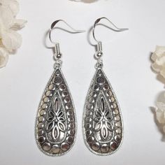 Don't You Just Love The Ornate Design Of These Handmade Nwt Statement Earrings? I Made These With Silver Toned Costume Jewelry Teardrop Shaped Charms That Are Antiqued In Black To Show Off The Details. They Dangle And Drop From 925 Sterling Silver French Fish Hooks Ear Wires For Pierced Ears. 2 1/8 Inch Tall And About 5/8 Inch Wide. The Approximate Weight Of Each Single Earring Is About 3.3 Grams. You Can Wear Them With Any Colored Outfit! Fashion Accessory Unique Funky Bohemian Boho Rustic Styl Silver Metal Teardrop Earrings For Gift, Silver Metal Teardrop Earrings As Gift, Silver Teardrop Metal Earrings For Gift, Silver Metal Teardrop Pendant Earrings, Silver Hypoallergenic Teardrop Earrings For Party, Hypoallergenic Silver Teardrop Earrings For Parties, Silver Teardrop Dangle Earrings, Nickel Free Silver Teardrop Pendant Earrings, Silver Bohemian Teardrop Earrings For Party