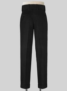 For your first good trousers, the universally accepted rule among the fashionable crowd is to keep it black and our Black Merino Double Gurkha Wool Trousers would be a great addition to your wardrobe. Crafted from wool blend, the trousers offer a stylish travel-friendly fabric that are great for summer nights, winter days and best for business trips.   Look Includes  Black Merino Wool Fabric  Cross Pocket  Two Pleated Front  Double Button Fastening Wide Waistband  Diamond Pocket On Right  1.5inc Black Winter Pants With Welt Pockets, Black Pants With Welt Pockets For Winter, Tailored Black Ankle-length Dress Pants, Tailored Black Dress Pants, Tailored Black Dress Trousers, Black Tailored Dress Trousers, Black Wool Pants For Winter, Tailored Black Work Pants For Business Casual, Business Winter Full-length Bottoms