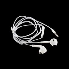 an earphone with headphones attached to it on a black background and white cord