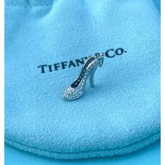 Tiffany & Co. Platinum 750 Stiletto Diamond High Heel Shoe Pendant Charm - *Mini * *Size Mini - See Photos For Measurements * In Like-New Condition * Retired- Rare & Hard To Find * Charm Only, No Chain Included. For A Necklace Or Bracelet. * A Staple Piece For Any Tiffany Lover Or A Great Gift Idea. * Metal: Platinum 950 * Weight: 1.71g * Hallmarks: T& Co. 950 Italy * Comes With A Pouch Special Notes: * Photos Have Been Enlarged To Provide Best Details. * Condition Rating Is Subjective And I Have Accessed This Item To The Best Of My Ability. * Collectible - Will Make A Perfect Gift Or A Great Addition To A Jewelry Collection. * If Per Chance I Had Overlooked Any Critical Deta Diamond High Heels, Shoe Pendant, Fine Jewellery Necklace, Staple Pieces, Tiffany & Co., High Heel Shoes, Womens Jewelry Necklace, High Heel, Jewelry Necklace Pendant