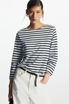 Breton Tops Are Back, and These Are the 22 Best Outfits | Who What Wear Minimalist Clothing Brands, Capsule Wardrobe 2023, Ultimate Capsule Wardrobe, Capsule Wardrobe Checklist, Minimalist Clothes, Boat Neck Top, Winter Capsule Wardrobe, Spring Capsule Wardrobe