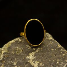 Black Onyx Ring | Handmade Ancient Ring | 925 Sterling Silver 24K Gold Plated | Oval Onyx Gemstone Ring | Minimalist Jewelry Gift Our shop offer free ring sizing Handcrafted hammered ring Metal : 925 Sterling Silver Plating : 24K Gold Band Width : 2 mm Gem Size : 19 X 1 mm Gem : Onyx Ring Weight : 5 grams Ring Size : US 6 (The size you want is made for free). (We used the US standard sizing) **Custom Orders is Made** As pellada family, we will be happy to help you if you contact us with the phot Gold Oval Onyx Rings, Minimalist Onyx Oval Ring, Onyx Oval Cabochon Rings For Gift, Oval Cabochon Onyx Ring Gift, Hammered Jewelry, Green Emerald Ring, Coin Ring, Black Onyx Ring, Onyx Gemstone