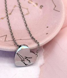 Looking for a truly special gift?  Personalized handwritten stainless steel necklace for a keepsake that your best friend or special someone will cherish, with custom handwritten jewelry that adds a unique touch. How to Order: 🎁 1. Choose Silver or Rose Gold 2. Choose One Sided or Double Sided 3. Add to Cart 4. Check Out 5. Message us via Etsy Messages with Actual Photo of Handwritten Message Details: 🌟 Approx. Weight: 5 grams Approx. Chain Dimensions(mm): 1.5mm x 457.2mm Approx. Chain Dimensi Personalized Stainless Steel Jewelry For Best Friend Gift, Customizable Stainless Steel Jewelry For Best Friend, Customized Stainless Steel Jewelry For Memorials, Silver Name Necklace For Best Friend, Customized Stainless Steel Jewelry For Memorial, Personalized Stainless Steel Necklace For Keepsake, Personalized Stainless Steel Jewelry For Memorial, Customized Stainless Steel Memorial Jewelry, Personalized Stainless Steel Keepsake Necklace