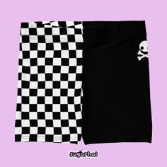 Black and white split pattern shorts. Checkerboard pattern on one side, solid black on the other side with mini skull and crossbones detail on the hip. Perfect for people who love being spooky and looking cute. Four-way stretch fabric Smooth microfiber yarn Comfortable elastic waistband Original artwork Plus sizes available Sizing tip: Take a pair of shorts that fit you the way you like, lay them flat and measure them according to my size chart (in images), then compare your measurements to the Edgy Black Biker Shorts, Grunge Style Shorts For Alternative Fashion, Black Fitted Alternative Style Shorts, Edgy Black Short Biker Shorts, Alternative Fashion Black Bottoms With Skull Print, Edgy Black Shorts For Alternative Fashion, Black Casual Shorts For Alternative Fashion, Casual Black Shorts For Alternative Fashion, Punk Black Shorts With Built-in Layer