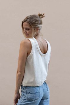 The makali tank top is knitted from the softest cashmere and organic cotton blend that feels smooth against the skin and doesn't itch. it is light and airy for summer and has a slight oversized fit. effortless to layer and easy to tuck in. it is made from leftover yarn that is undyed which makes it even more sustainable.    70% organic cotton 30% recycled cashmere. made in lithuania in a small family owned factory.    model is wearing size xs. Leftover Yarn, Finnish Fashion, Recycled Cashmere, Knit Bottom, Komodo, Knitwear Dress, Half Zip Sweaters, Jumper Shirt, Small Family