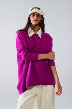 The Oversized Crew Neck Long Sleeve Sweater in Fuchsia is a vibrant addition to your wardrobe, perfect for adding a pop of color to any outfit. Crafted from a cozy blend of 40% viscose, 32% nylon, and 28% polyester, this fine-knit sweater offers both comfort and style.  With its relaxed, oversized fit, the sweater drapes effortlessly, making it ideal for layering or wearing on its own. The classic crew neckline and long sleeves contribute to its timeless appeal, while the bold fuchsia hue brings a lively touch to your look. This versatile piece can be easily paired with neutral tones, allowing you to create a variety of stylish ensembles, from casual to boho-inspired outfits.  The model, who is wearing a size U, measures 33 inches at the bust, 25 inches at the waist, and 35 inches at the h Fuchsia Sweater Outfit, Basic Sweater, Fine Knit Sweater, Boho Fabric, Basic Sweaters, Outfit Winter, Fuchsia Color, Estilo Boho, Style Boho