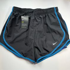 Brand: Nike Condition: New With Tag Size: Xs Color: Black Blue Retail Price$ $40 The Snug Inner Layer Helps Prevent Chaffing So You Can Push Yourself With Ultimate Coverage. I Am Poshmark Top Rated Seller With 100% Customer Satisfaction, While Being A Staying Home Mom With Kids Please Let Me Know If You Have Any Questions Thanks For Supporting My Little Business New Listing Daily Ww33 Nike Sporty Athletic Shorts For Workout, Casual Nike Activewear For Running, Nike Athletic Shorts For Running And Sports Season, Casual Black Running Shorts, Nike Black Athletic Shorts For Gym, Sporty Black Athletic Shorts For Jogging, Nike Black Athletic Shorts For Running, Nike Black Athletic Shorts For Workout, Nike Black Athletic Fit Bottoms