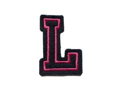 a black and pink patch with the letter l in it's center, on a white background