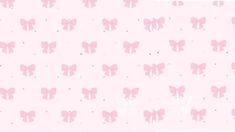 a pink background with small bows on it