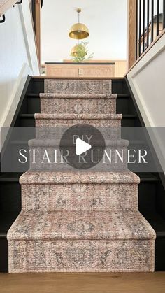 a stair runner is going up the stairs