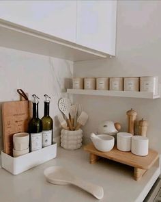 the kitchen counter is clean and ready to be used as a storage area for cooking utensils