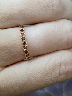 SALE January birthstone ringGemstones by CandySimpleJewelry Gold Stackable Ruby Birthstone Ring, Garnet Birthstone Ring In Yellow Gold, Dainty Garnet Birthstone Ring, Dainty Gold Ruby Birthstone Ring, Gold Ruby Ring With Halo In 14k Gold, Gold Ruby Halo Ring In 14k, 14k Gold Ruby Ring With Halo Design, Dainty Gold Ruby Ring With Gemstones, Gold Ruby Ring With Halo For Gift