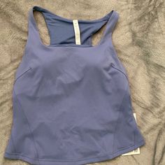 Please Contact Me If You Have Any Questions. Never Worn. New With Tags. Blue Racerback Tops For Pilates, Functional Blue Tops For Pilates, Lululemon Athletica, Color Blue, Size 12, Womens Tops, Tank Tops, Tags, Women Shopping