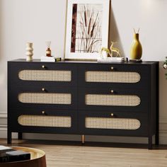 a black and gold sideboard in a living room